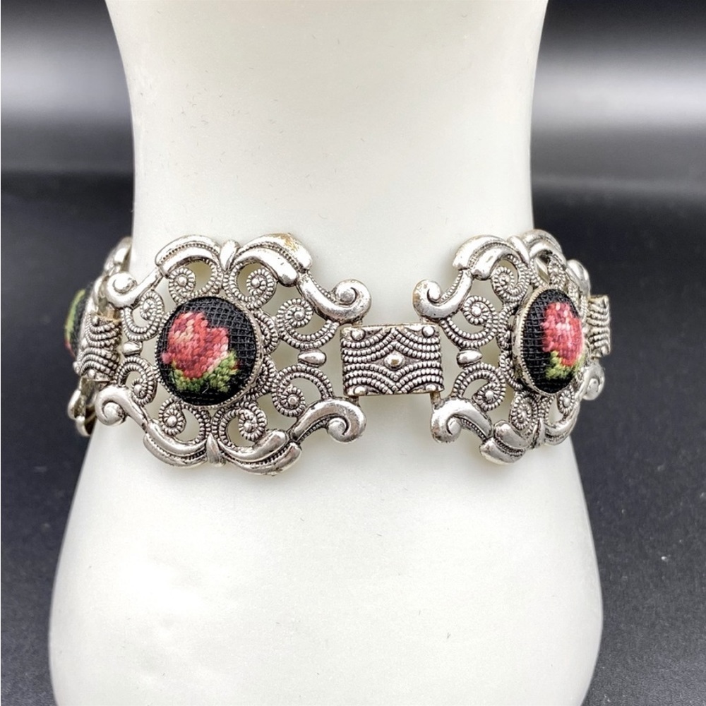 Silver Filagree bracelet with embroidered red roses on black background